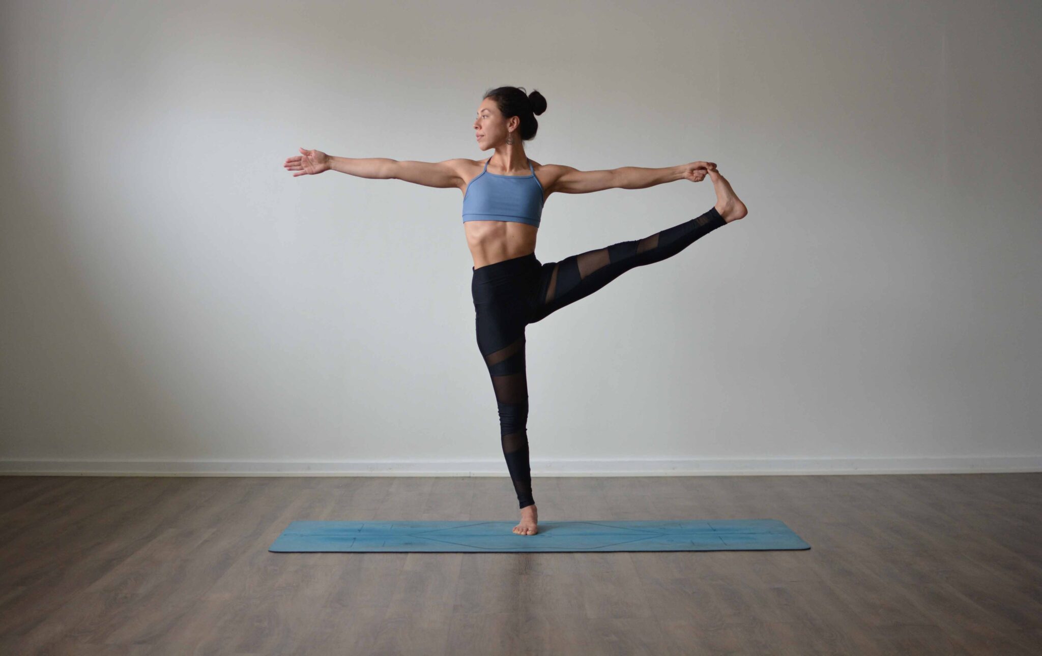 Yoga Pose: Revolved Seated Hand to Big Toe | Pocket Yoga
